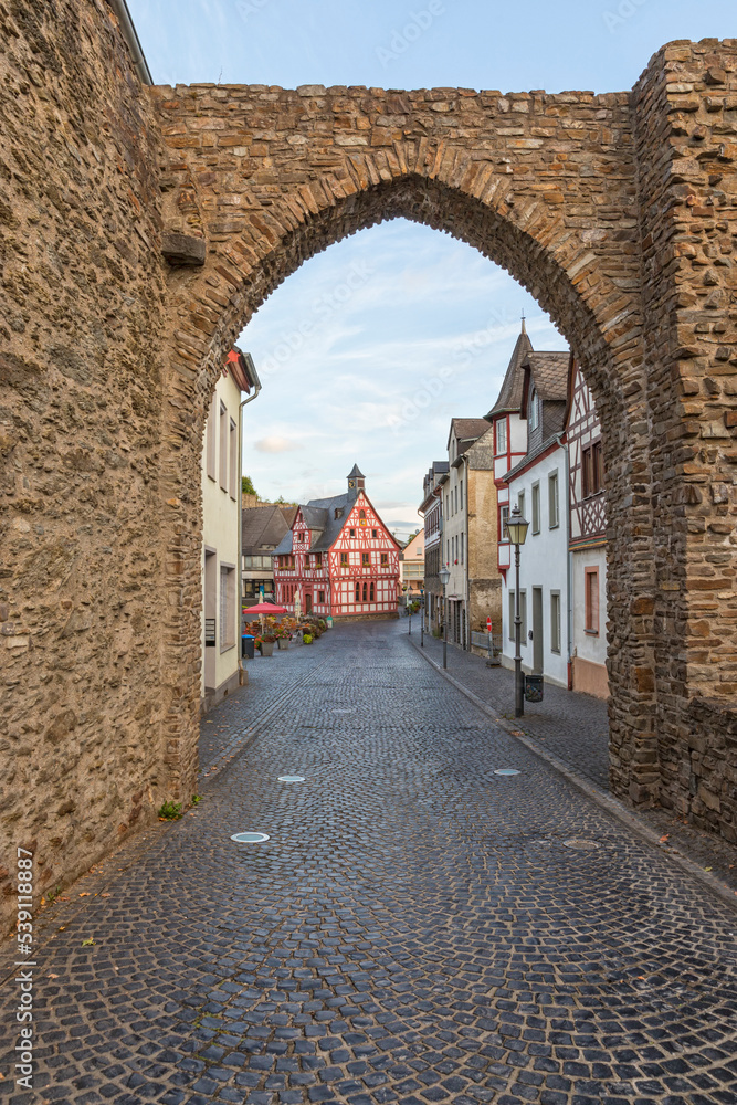 City gate and historic town hall of Rhens in the Upper Middle Rhine Valley