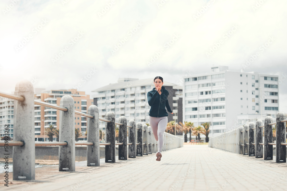 Sports, fitness and woman running on sidewalk with speed, energy and determination outdoors for exercise in Los Angeles. Girl, wellness and healthy runner sprinting for cardio training and workout Sports, fitness and woman running on sidewalk with speed, energy and determination outdoors for exercise in Los Angeles. Girl, wellness and healthy runner sprinting for cardio training and workout