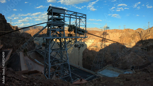 Hoover Dam is a concrete arch-gravity dam in the Black Canyon of the Colorado River, on the border between the U.S. states of Nevada and Arizona.