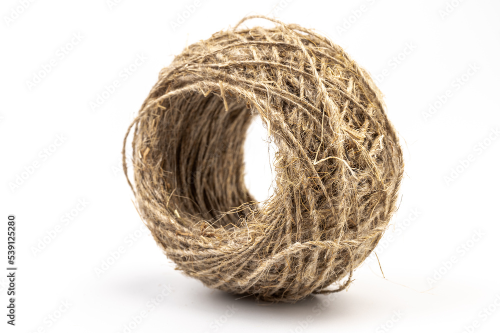 Jute twine isolated on white background. hank of twine close-up. Jute twine isolated on white background. hank of twine close-up.