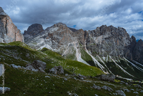 The landscape and the peaks of the Dolomites of the Val di Fassa, one of the most famous and touristic valleys of Trentino, near the town of Canazei, Italy - August 2022.