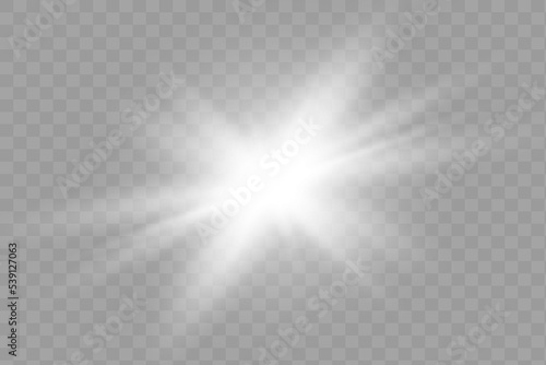 Yellow glowing light explodes on a transparent background. Sparkling magical dust particles. Bright Star. photo