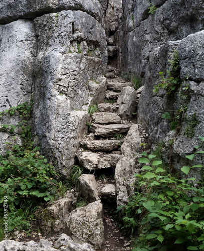 Fairy Steps.
Steep steps through a narrow cleft in Limestone rocks part of the historic coffin route between Milnthorpe and Arnside, Cumbria, UK. photo