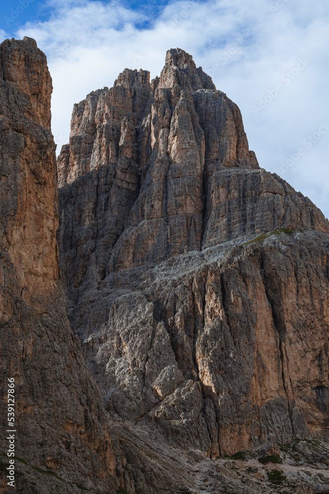 The landscape and the peaks of the Dolomites of the Val di Fassa, one of the most famous and touristic valleys of Trentino, near the town of Canazei, Italy - August 2022.