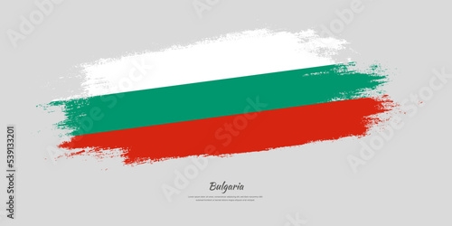 Happy Independence Day of Bulgaria. National flag on artistic stain brush stroke background.