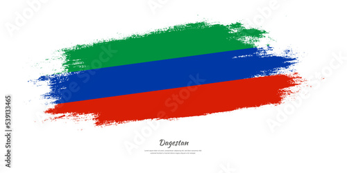 Happy Independence Day of Dagestan. National flag on artistic stain brush stroke background.