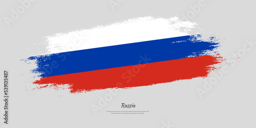 Happy National Day of Russia. National flag on artistic stain brush stroke background.