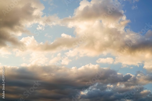 Astonishing sunset sky with stratocumulus clouds, background photo