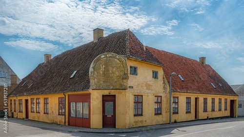 View of Guldborgsund municipality building in Stubbekobing, Denmark under blue sky photo