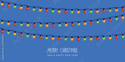 christmas greeting card with colorful fairy light