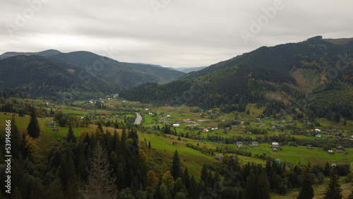 Fototapeta Naklejka Na Ścianę i Meble -  Panorama of the beautiful mountains. Village in the valley.