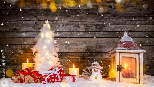 Christmas Still Life with Old Wooden Background and Snowflakes Falling