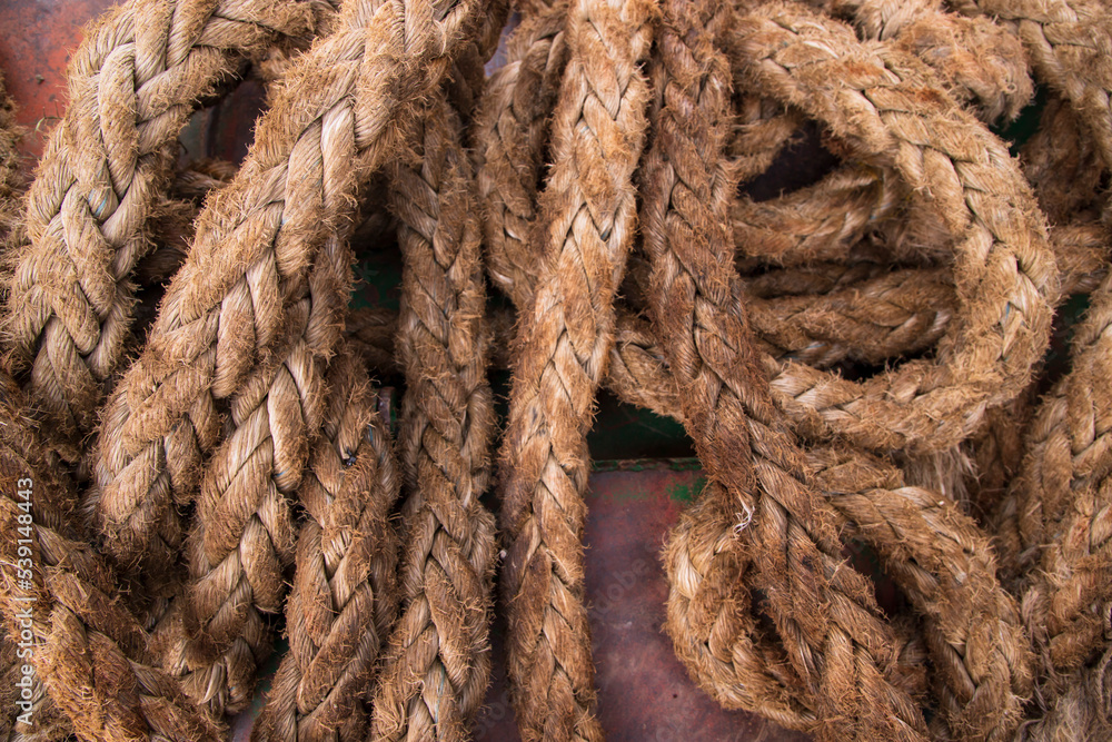 Stack dirty jute rope can be used as a background texture Stack dirty jute rope can be used as a background texture