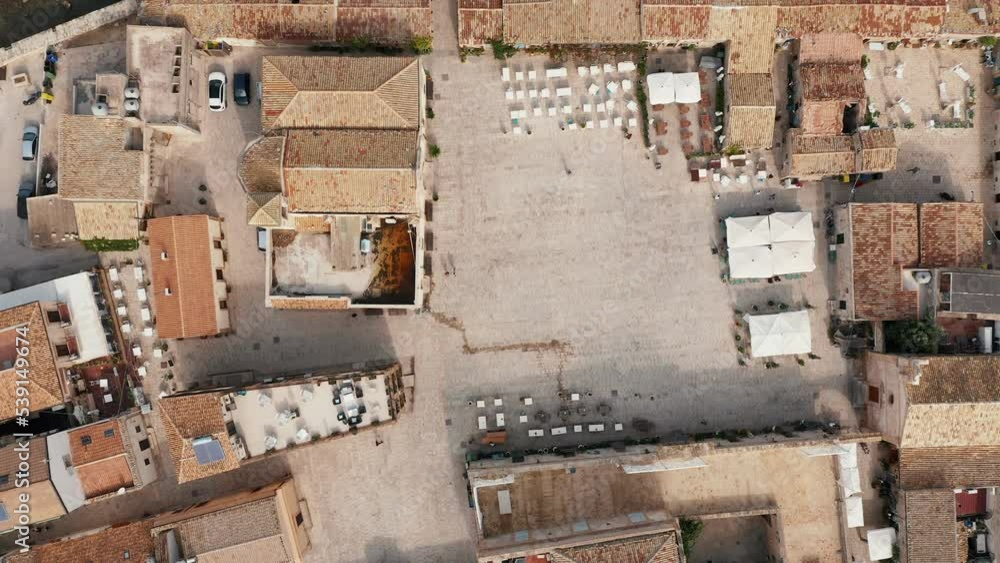 Top View Of Antico Borgo Dei Pescatori At The Historical Hamlet Of Marzamemi In The Province Of Syracuse, Sicily, Italy. Aerial Drone Shot Top View Of Antico Borgo Dei Pescatori At The Historical Hamlet Of Marzamemi In The Province Of Syracuse, Sicily, Italy. Aerial Drone Shot