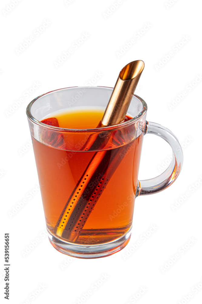 A cup of rooibos tea. Close-up view of a refreshing cup of tea in a plain white glass. A cup of rooibos tea. Close-up view of a refreshing cup of tea in a plain white glass.
