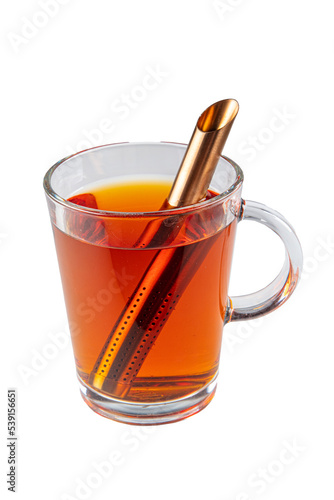 A cup of rooibos tea. Close-up view of a refreshing cup of tea in a plain white glass.