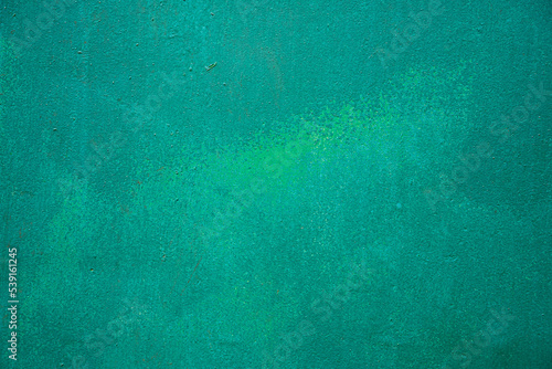 Aged green weathered textured background.