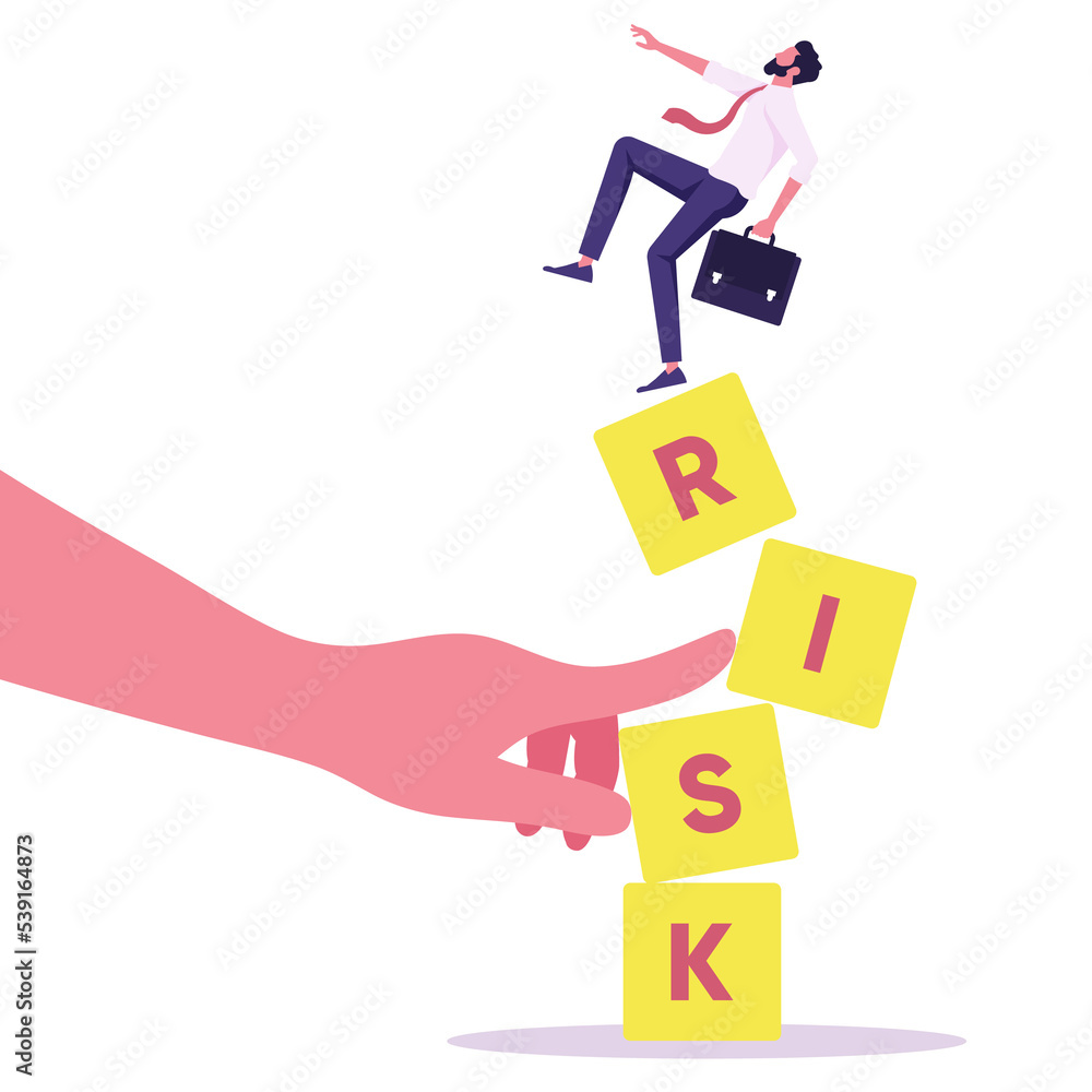 Businessman standing on shaky risk blocks by hand of enemy,Stability or balance of economics and investment, Investment risk concept