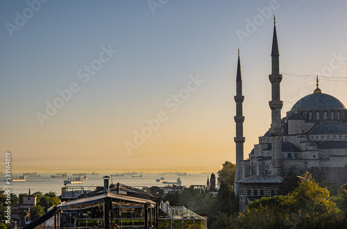 Ayia Sofia in beautiful summer evening with ships on the horizon