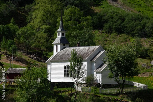 Old Bakka church surrounded by trees in the Bakka village Norway during daytime photo