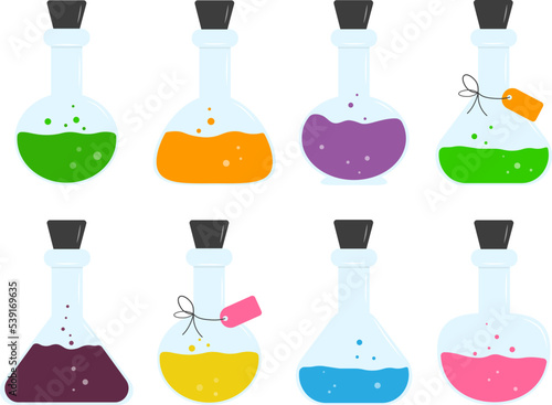 Multi-colored magic potion in glass test tubes with and without tags
