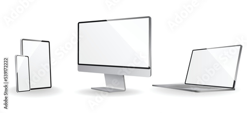 Electronic devices mockups. White desktop monitor, laptop, tablet and phone set. New version of modern, premium hardware. Gadget template with shadow isolated on white background