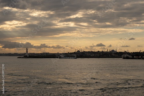 Marvelous yellow mystical dramatic sky over Istanbul over a the port of in Kadiköy