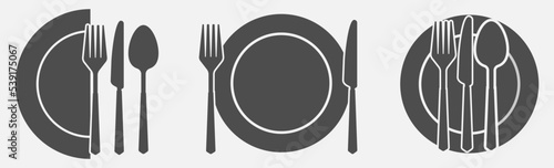 Set of fork and knife on a plate. Cutlery fork spoon and plate. vector sketch isolated	