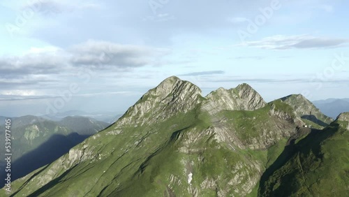 Forward shooting from drone gorgeous natural mountain cliff with gazex summit by sunny landscape clear blue sky. Aerial view adorable rocky peak atmosphere cloudscape cinematic forecast weather. 4k  photo