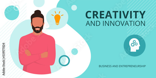 Creative man posing with arms crossed