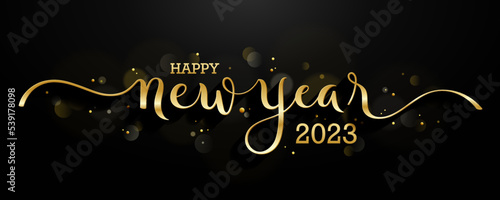 HAPPY NEW YEAR 2023 metallic gold brush calligraphy banner on black background