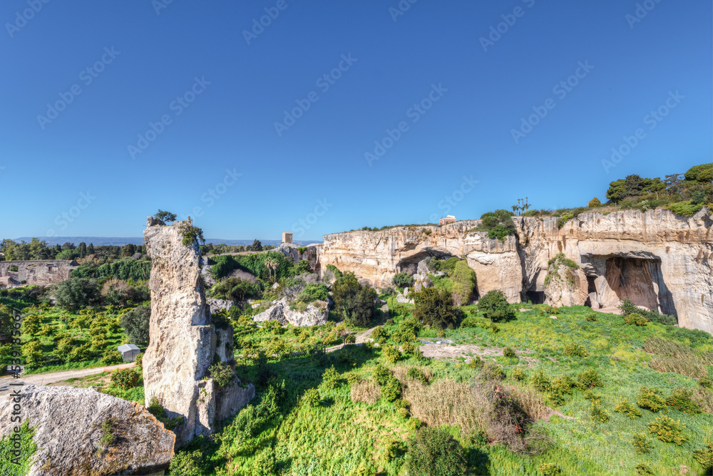 Syracuse Sicily, the quarries of paradise inside the Neapolis archaeological park. Syracuse Sicily, the quarries of paradise inside the Neapolis archaeological park.