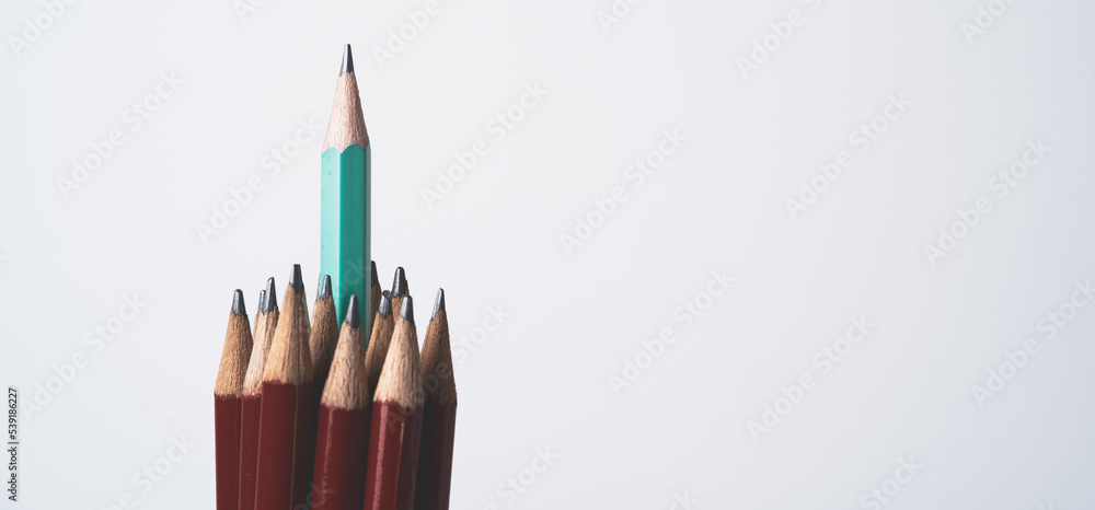 Blue pencil move out of red pencils for outstanding leadership and different thinking of idea concept. Blue pencil move out of red pencils for outstanding leadership and different thinking of idea concept.