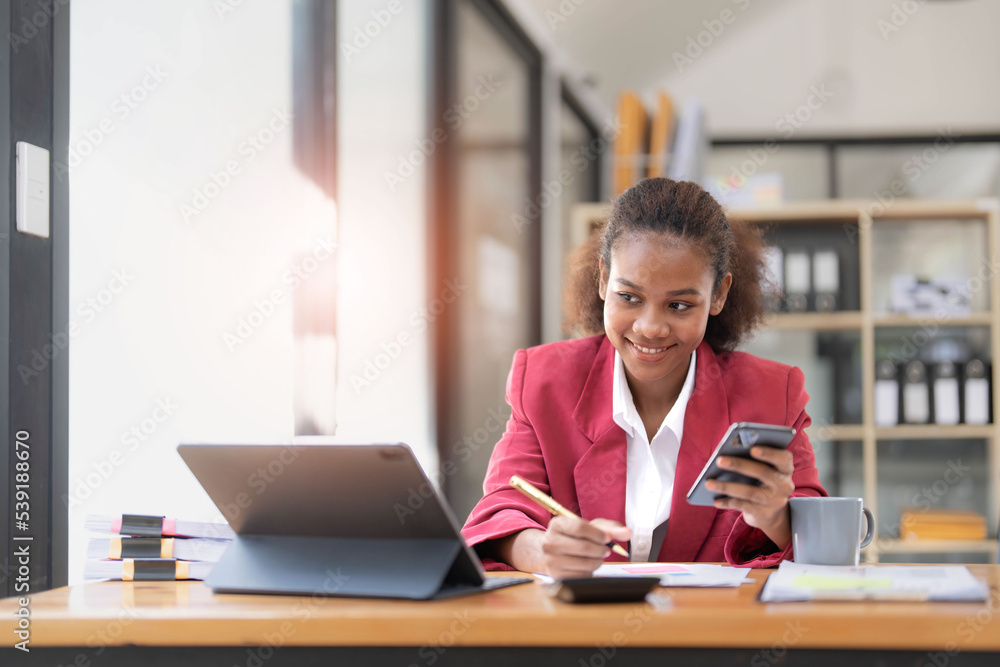 Photo of cheerful positive entrepreneur smiling toothily seeing message from her boss praising her about project finished and startup realized Photo of cheerful positive entrepreneur smiling toothily seeing message from her boss praising her about project finished and startup realized