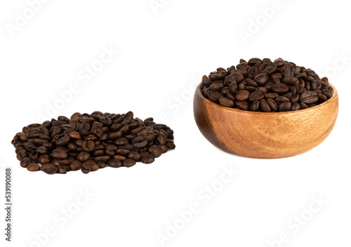 Freshly roasted Arabica and Robusta coffee beans on a white background.