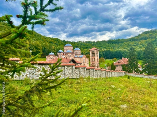 Beautiful old medieval Celije Monastery in the green forest photo