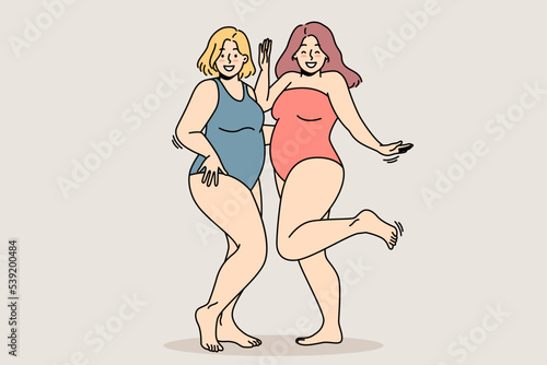 Chubby girls in swimsuits stand next to each other, smile, enjoy their figures. Body positive concept. Fat young women acceptance their shapes. Plus size ladies laugh. Vector isolated illustration.