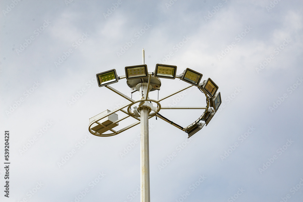 Close-up of towering large street lamps in the city Close-up of towering large street lamps in the city