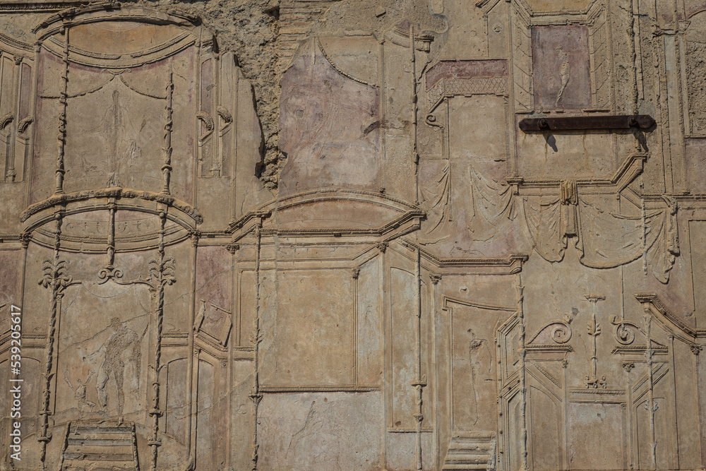 Obraz premium Weathered and aged frescos from the ruins of Pompeii in Italy.