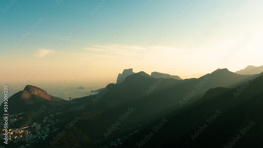 Sunset in the mountains. Panoramic view from Corcovado, Brasil.