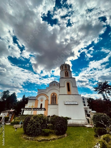 Low angle shot of St. Archangel Michael church against a cloudy sky in Skopje, North Macedonia photo