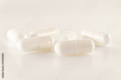 Medical capsules, pills on a white background close-up. Medical drug. Health. Treatment