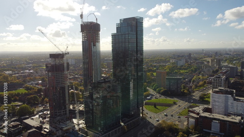 Aerial view of modern skyscrapers under construction. Taken in Manchester England. 