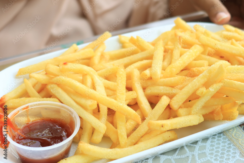 detail shot of French Fries on table detail shot of French Fries on table