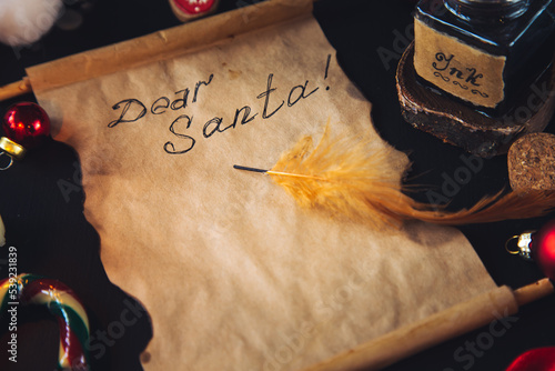 Letter to Santa Claus, inkwell with feather, Christmas decor. photo