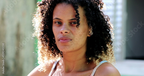 Hispanic latin woman from south america. Portrait Brazilian person. Serious expression