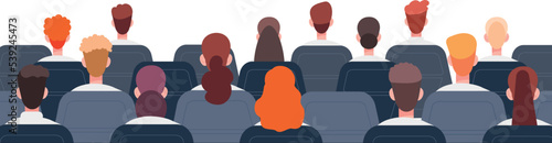 Audience back view. People sitting in chairs and listening