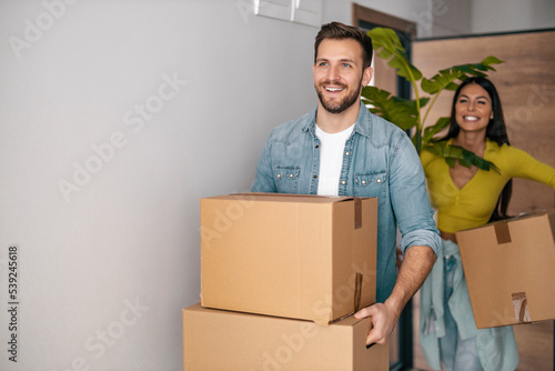 Young couple moving to a new home