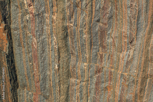 The texture of an iron ore mineral rock, a type of iron ore with impurities. The texture of a natural stone.
