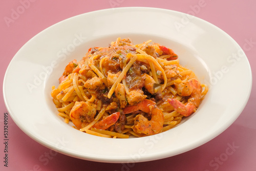 Pasta Jambalaya with tomato served in a dish isolated on background side view of fastfood